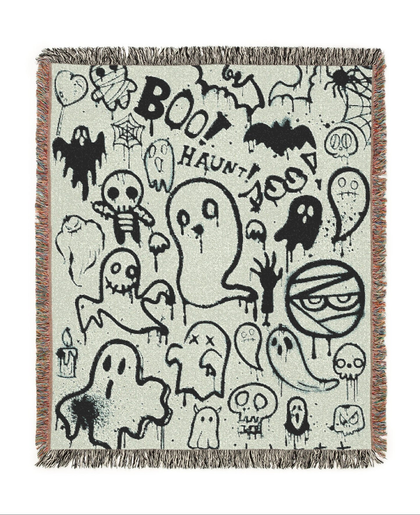 Halloween-themed blanket with ghost, ghostbusters, and ghost face designs on a white background.